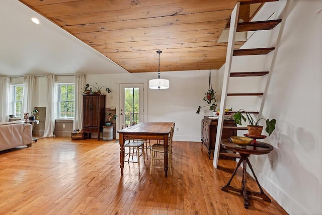 39 Lobo Ln, West Gardiner, ME 04345 - dining space featuring light wood-style floors, baseboards, vaulted ceiling, wooden ceiling, and stairs