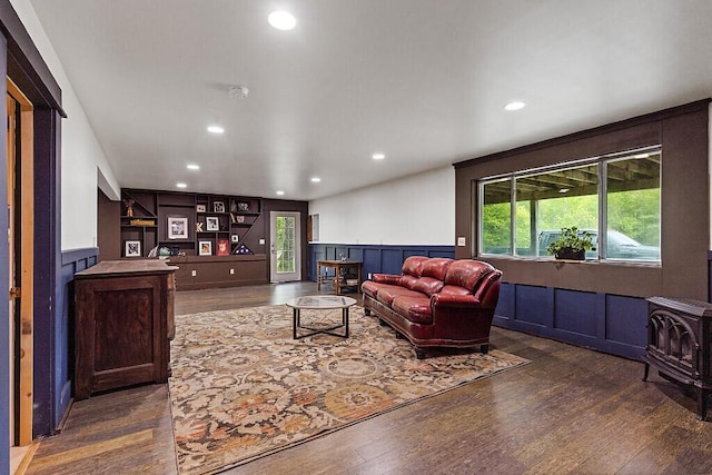 39 Lobo Ln, West Gardiner, ME 04345 - living area with dark wood finished floors, a decorative wall, recessed lighting, plenty of natural light, and a wainscoted wall