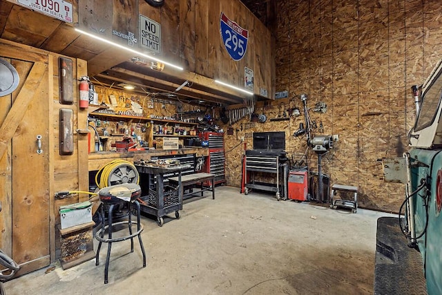 39 Lobo Ln, West Gardiner, ME 04345 - miscellaneous room with a workshop area and concrete flooring
