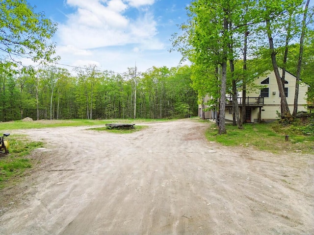 39 Lobo Ln, West Gardiner, ME 04345 - view of dirt / gravel driveway with a view of trees