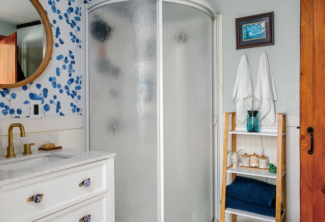 313 Sam Allen Rd, Sanford, ME 04073 - bathroom with a shower stall, wallpapered walls, and vanity
