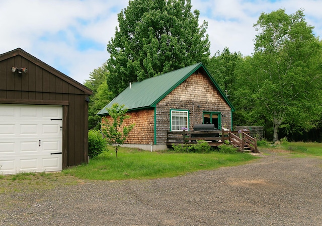 313 Sam Allen Rd, Sanford, ME 04073 - view of side of home featuring a garage