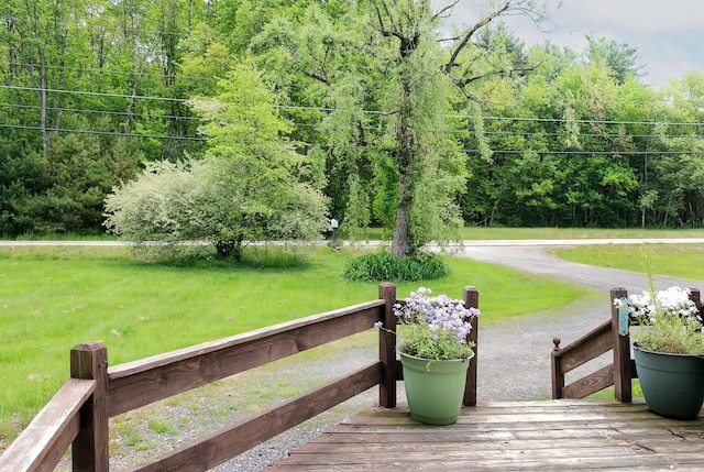 313 Sam Allen Rd, Sanford, ME 04073 - deck with a forest view and a lawn