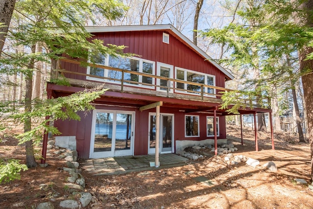 54 Papoose Island Rd, Raymond, ME 04071 - back of house featuring a wooden deck