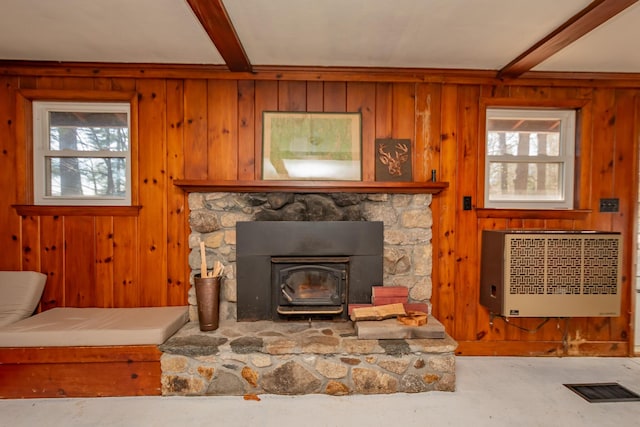 54 Papoose Island Rd, Raymond, ME 04071 - living room with wood walls, beam ceiling, and heating unit