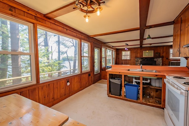 54 Papoose Island Rd, Raymond, ME 04071 - kitchen with wood walls, electric stove, healthy amount of natural light, a sink, and beam ceiling