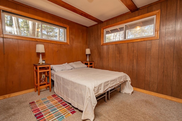 54 Papoose Island Rd, Raymond, ME 04071 - carpeted bedroom with multiple windows, beamed ceiling, and wood walls