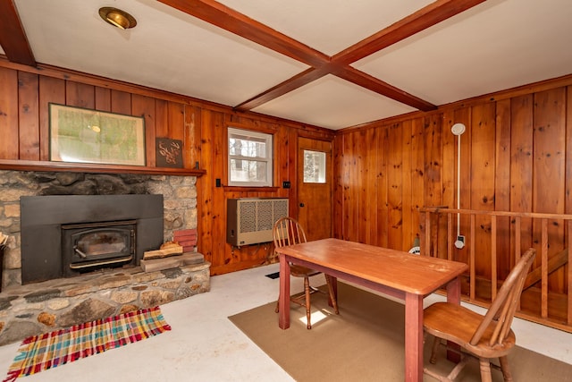 54 Papoose Island Rd, Raymond, ME 04071 - dining room with heating unit, wooden walls, a wood stove, coffered ceiling, and beamed ceiling