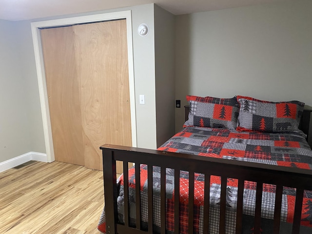 476 Springy Pond Rd, Otis, ME 04605 - bedroom with wood finished floors and baseboards
