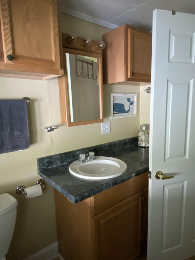 476 Springy Pond Rd, Otis, ME 04605 - half bathroom with vanity and toilet