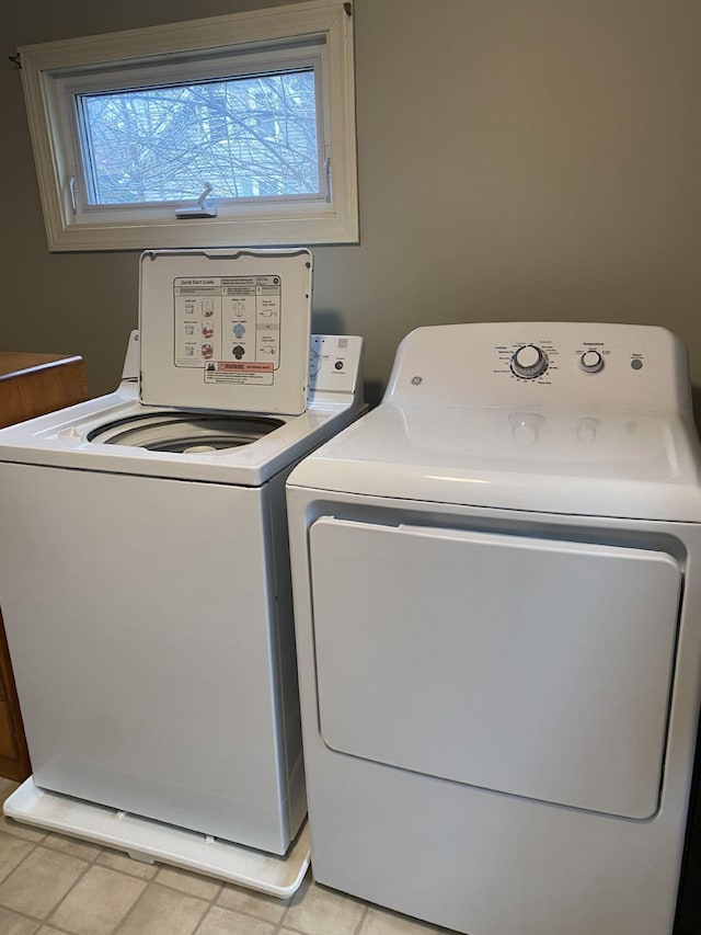 476 Springy Pond Rd, Otis, ME 04605 - washroom with independent washer and dryer and light tile patterned flooring