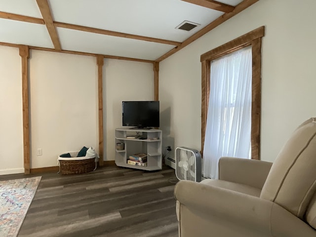 3 Brook St, Lisbon, ME 04250 - living area with wood finished floors, baseboards, and baseboard heating