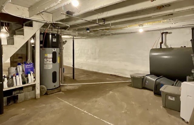 3 Brook St, Lisbon, ME 04250 - unfinished basement featuring hybrid water heater, heating fuel, and stairs