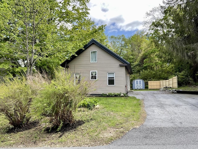 3 Brook St, Lisbon, ME 04250 - view of side of home featuring driveway