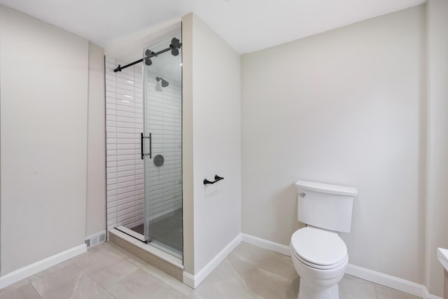 50 14th St, Bangor, ME 04401 - full bath featuring a stall shower, toilet, baseboards, and tile patterned floors