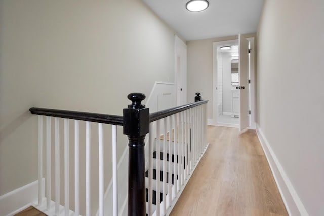 50 14th St, Bangor, ME 04401 - corridor featuring an upstairs landing, light wood-style floors, and baseboards