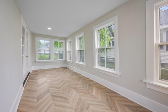 50 14th St, Bangor, ME 04401 - unfurnished sunroom featuring plenty of natural light, baseboards, and recessed lighting