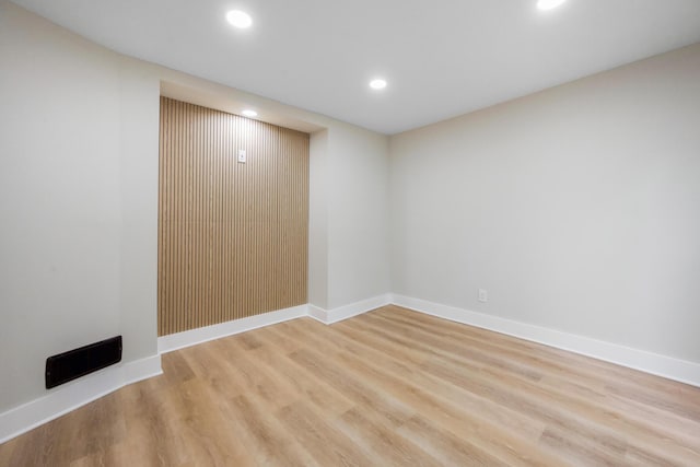 50 14th St, Bangor, ME 04401 - finished basement with recessed lighting, light wood-type flooring, and baseboards