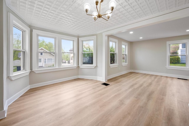 50 14th St, Bangor, ME 04401 - unfurnished sunroom featuring a chandelier