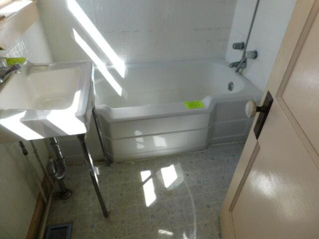 10 Summer St, Calais, ME 04619 - full bath featuring bathing tub / shower combination