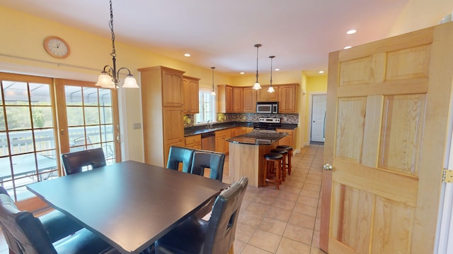 335 Western Ave, Hampden, ME 04444 - dining room with light tile patterned floors and recessed lighting