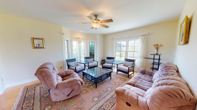 335 Western Ave, Hampden, ME 04444 - living area featuring wood finished floors, ceiling fan, and baseboards