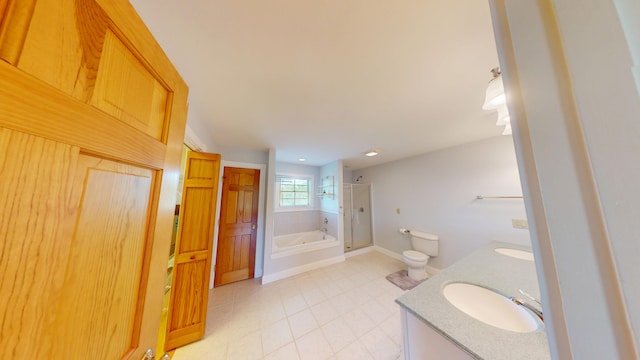 335 Western Ave, Hampden, ME 04444 - bathroom with a garden tub, a shower with shower door, double vanity, tile patterned floors, and baseboards