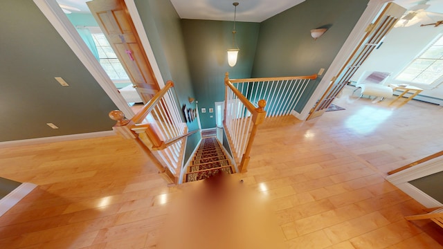 335 Western Ave, Hampden, ME 04444 - stairway with baseboards and wood finished floors