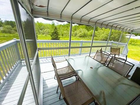 335 Western Ave, Hampden, ME 04444 - sunroom with outdoor dining area