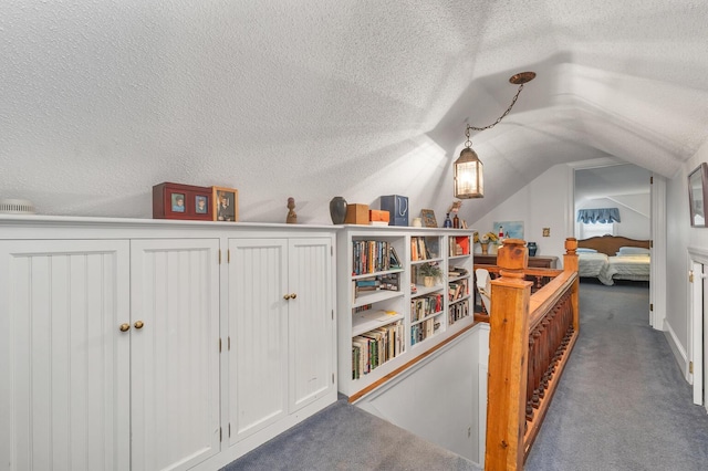 7 Acorn Cir Unit 7, Kennebunk, ME 04043 - bonus room with carpet, lofted ceiling, and a textured ceiling