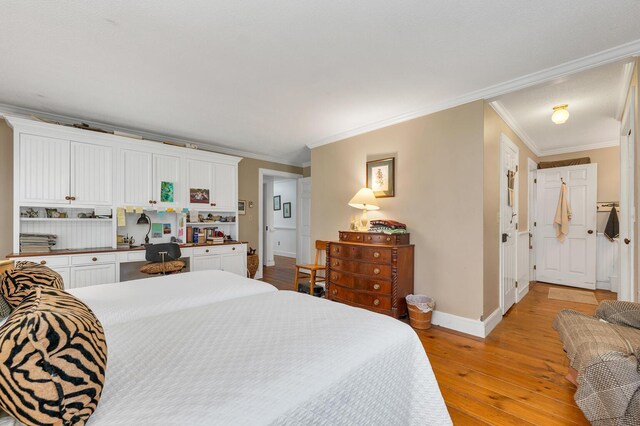7 Acorn Cir Unit 7, Kennebunk, ME 04043 - bedroom with baseboards, light wood-style floors, and crown molding