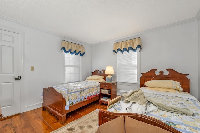 7 Acorn Cir Unit 7, Kennebunk, ME 04043 - bedroom featuring wood-type flooring, ornamental molding, and baseboards