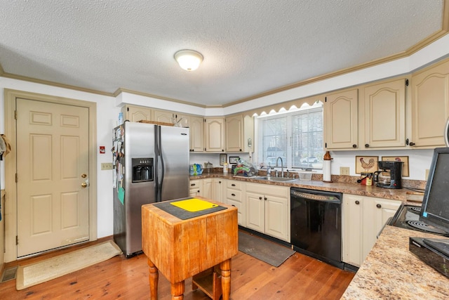 7 Acorn Cir Unit 7, Kennebunk, ME 04043 - kitchen featuring black dishwasher, stainless steel refrigerator with ice dispenser, a sink, crown molding, and hardwood / wood-style floors