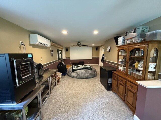 20 Lady Jennifer Dr, Biddeford, ME 04005 - cinema featuring a wall unit AC, a ceiling fan, light colored carpet, and recessed lighting