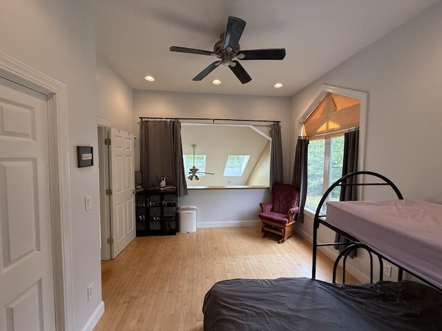 20 Lady Jennifer Dr, Biddeford, ME 04005 - bedroom with light wood-type flooring, a skylight, baseboards, recessed lighting, and a ceiling fan