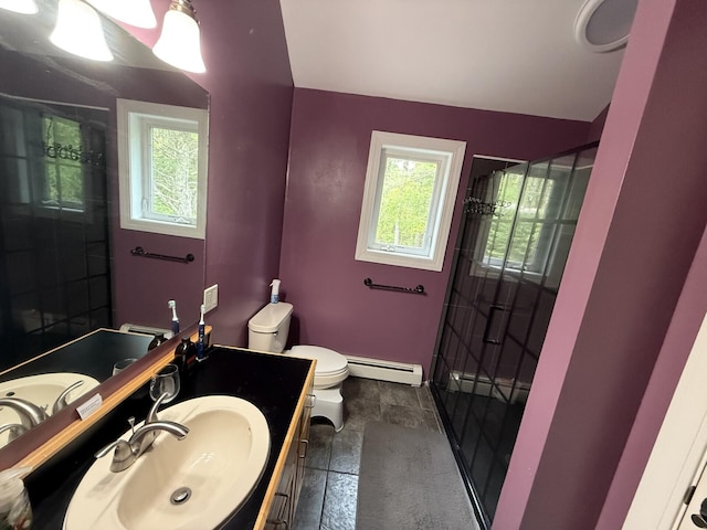 20 Lady Jennifer Dr, Biddeford, ME 04005 - full bath featuring baseboard heating, toilet, a shower with shower door, stone tile floors, and vanity