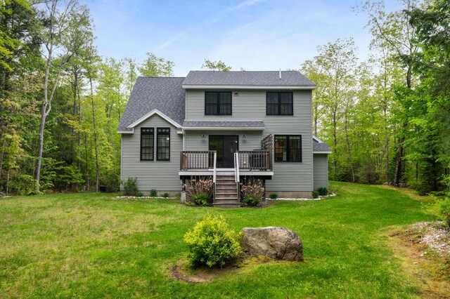 14 Winter Hills Ln, Ogunquit, ME 03907 - view of front facade with a deck, stairs, a front yard, and roof with shingles