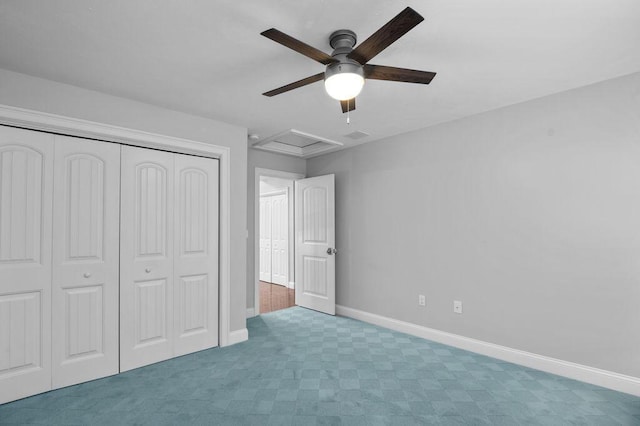 14 Winter Hills Ln, Ogunquit, ME 03907 - unfurnished bedroom featuring attic access, a closet, baseboards, and ceiling fan
