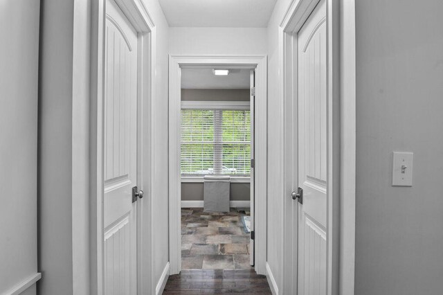14 Winter Hills Ln, Ogunquit, ME 03907 - hallway featuring dark stone finish flooring and baseboards
