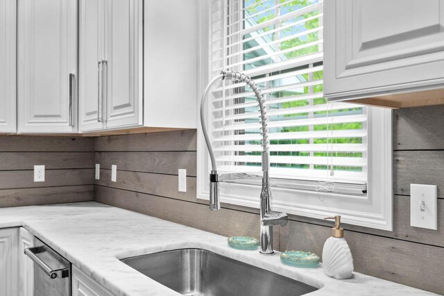 14 Winter Hills Ln, Ogunquit, ME 03907 - kitchen with white cabinetry, a sink, light stone countertops, and dishwasher