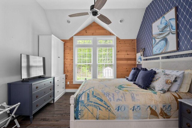 14 Winter Hills Ln, Ogunquit, ME 03907 - bedroom with dark wood-style flooring, lofted ceiling, wood walls, and ceiling fan