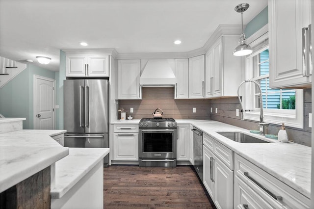 14 Winter Hills Ln, Ogunquit, ME 03907 - kitchen featuring stainless steel appliances, custom exhaust hood, a sink, white cabinets, and recessed lighting