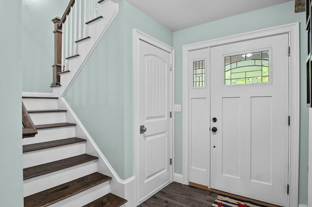 14 Winter Hills Ln, Ogunquit, ME 03907 - foyer entrance with stairway, dark wood-style floors, and baseboards