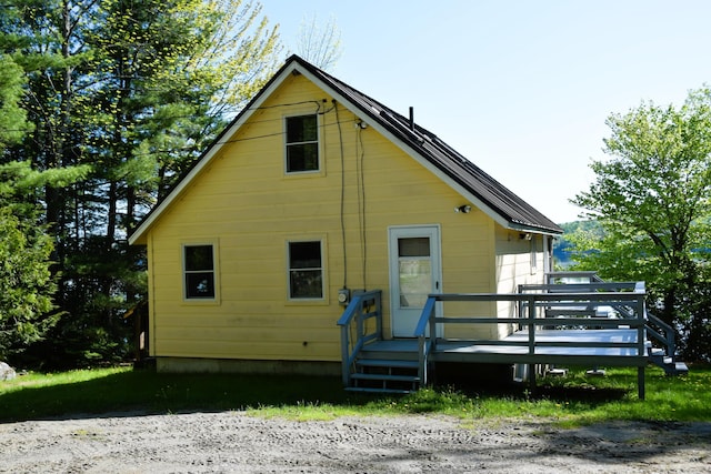 1809 Embden Pond Rd, Embden, ME 04958 - rear view of house with a deck