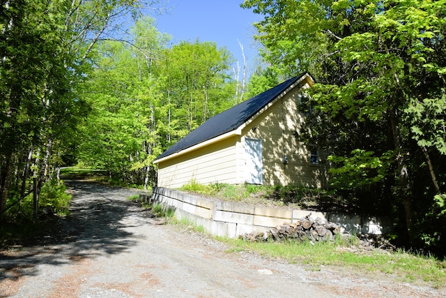 1809 Embden Pond Rd, Embden, ME 04958 - view of side of home featuring dirt driveway