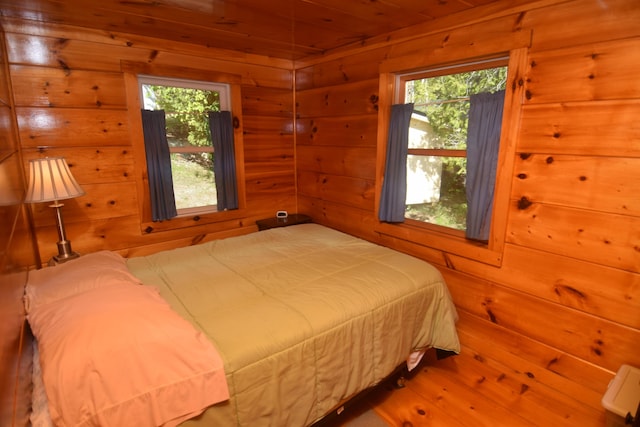 1809 Embden Pond Rd, Embden, ME 04958 - bedroom featuring wooden walls