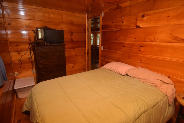 1809 Embden Pond Rd, Embden, ME 04958 - bedroom with wood walls