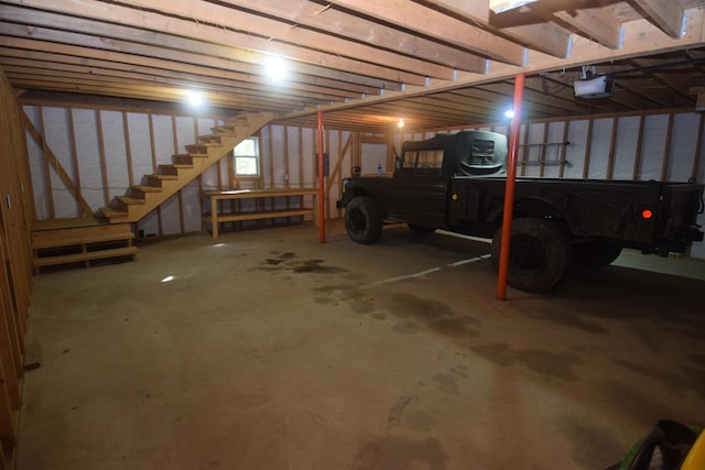 1809 Embden Pond Rd, Embden, ME 04958 - basement featuring a garage and stairway