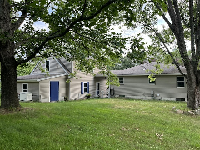 39 Thompson St, Wells, ME 04090 - back of property featuring a lawn and a shingled roof