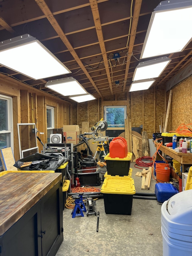 39 Thompson St, Wells, ME 04090 - misc room with concrete floors and a workshop area